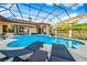 Relaxing pool and spa with covered patio and seating at 8376 Catamaran Cir, Lakewood Ranch, FL 34202