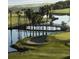 Aerial view of community with scenic golf course and water features at 900 Cove Cay Dr # 2B, Clearwater, FL 33760