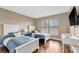 Bright bedroom with two twin beds and plenty of natural light at 900 Cove Cay Dr # 2B, Clearwater, FL 33760