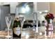 Kitchen counter with bottle of champagne and glasses at 900 Cove Cay Dr # 2B, Clearwater, FL 33760