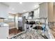 Modern kitchen with stainless steel appliances and granite countertops at 900 Cove Cay Dr # 2B, Clearwater, FL 33760