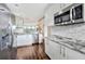 Modern kitchen with stainless steel appliances and granite countertops at 900 Cove Cay Dr # 2B, Clearwater, FL 33760