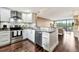 Modern kitchen featuring stainless steel appliances and granite countertops at 900 Cove Cay Dr # 2B, Clearwater, FL 33760