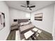 Spacious bedroom with large bed, nightstands, and wood floors at 9024 Evelyn Rd, Englewood, FL 34224