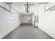 Garage interior with laundry hookups and overhead storage at 9201 40Th N Way, Pinellas Park, FL 33782