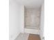 New bathroom with a bathtub and tile surround at 3430 Sarto Ln, Rotonda West, FL 33947