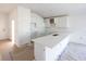 Modern kitchen featuring white cabinets and quartz countertops at 3430 Sarto Ln, Rotonda West, FL 33947