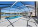 Spacious screened pool area with lake view at 10633 Weeping Elm Bnd, Land O Lakes, FL 34638