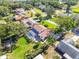Aerial view of home and neighborhood near lake at 11114 Lake Sassa Dr, Thonotosassa, FL 33592