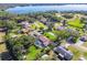 Aerial view showcasing home and lakefront community at 11114 Lake Sassa Dr, Thonotosassa, FL 33592