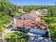 Aerial view of house, pool, and large backyard with lush landscaping at 11114 Lake Sassa Dr, Thonotosassa, FL 33592