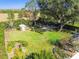 Expansive backyard with mature trees and landscaping at 11114 Lake Sassa Dr, Thonotosassa, FL 33592