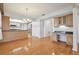 Spacious dining room with hardwood floors and chandelier at 11114 Lake Sassa Dr, Thonotosassa, FL 33592