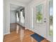 Bright and spacious entryway with hardwood floors and a beautiful glass door at 11114 Lake Sassa Dr, Thonotosassa, FL 33592