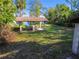 Picnic pavilion with tables and benches near the lake at 11114 Lake Sassa Dr, Thonotosassa, FL 33592