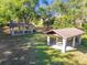 Two covered picnic areas with tables, offering a relaxing outdoor space at 11114 Lake Sassa Dr, Thonotosassa, FL 33592