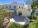 Stone patio adjacent to house and pool at 11114 Lake Sassa Dr, Thonotosassa, FL 33592