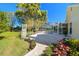 Spacious patio with flagstone and lush landscaping at 11114 Lake Sassa Dr, Thonotosassa, FL 33592