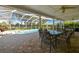 Relaxing screened-in pool area with patio furniture and a refreshing pool at 11114 Lake Sassa Dr, Thonotosassa, FL 33592