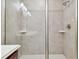 Large walk-in shower with tiled walls and floor at 11114 Lake Sassa Dr, Thonotosassa, FL 33592