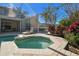Octagonal spa surrounded by lush landscaping adjacent to the pool at 11114 Lake Sassa Dr, Thonotosassa, FL 33592