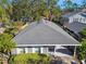 Gray roof, house with a carport, and surrounding trees at 116 S Hale Ave, Tampa, FL 33609