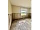 Cozy bedroom features a window view and potential for a serene retreat, awaiting personalized touches and creative renovation at 116 S Hale Ave, Tampa, FL 33609