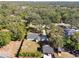 Aerial view of a house with a large backyard and detached garage at 12308 N 53Rd St, Temple Terrace, FL 33617