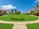 Landscaped lawn with walking paths at 1515 Pinellas Bayway S # 40, St Petersburg, FL 33715