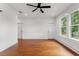 Bright bedroom with hardwood floors and ample closet space at 1903 E New Orleans Ave, Tampa, FL 33610