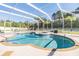 Inviting kidney-shaped pool with a spa and screened enclosure at 19829 Morden Blush Dr, Lutz, FL 33558