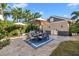 Backyard patio with dining area and outdoor kitchen at 2162 Dartmouth N Ave, St Petersburg, FL 33713