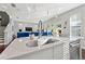 Kitchen island with a farmhouse sink and stainless steel appliances at 2162 Dartmouth N Ave, St Petersburg, FL 33713