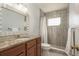 Clean bathroom with granite countertop, walk-in shower, and updated vanity at 2451 Canadian Way # 47, Clearwater, FL 33763