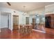 Bright dining room with a chandelier and mirrored wall at 2451 Canadian Way # 47, Clearwater, FL 33763