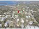 Aerial view showcasing home's waterfront neighborhood location at 323 Ridge Rd, Palm Harbor, FL 34683