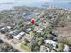 Aerial view highlighting home's location by the water at 323 Ridge Rd, Palm Harbor, FL 34683