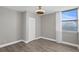 Bedroom with hardwood floors, a window, and a closet at 4015 Bayshore Blvd # 16A, Tampa, FL 33611