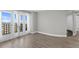 Bedroom with balcony access, hardwood floors, and water views at 4015 Bayshore Blvd # 16A, Tampa, FL 33611