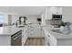 Modern kitchen with white cabinets and quartz countertops at 4015 Bayshore Blvd # 16A, Tampa, FL 33611