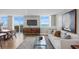 Bright living room with bay views, stylish furniture, and hardwood floors at 4015 Bayshore Blvd # 16A, Tampa, FL 33611