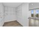 Spacious walk-in closet with wire shelving and wood-look flooring at 4015 Bayshore Blvd # 16A, Tampa, FL 33611