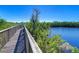 Scenic nature trail boardwalk overlooking a tranquil waterway at 4323 Bayside Village Dr # 327, Tampa, FL 33615