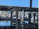 Boat lift at the marina in a covered slip, with waterfront views and boat dock at 4500 37Th S St # 27, St Petersburg, FL 33711