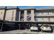 Three story condo with covered parking, stairs to the upper levels, and neutral exterior color at 4500 37Th S St # 27, St Petersburg, FL 33711