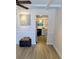 An opening from the living room shows the kitchen at 4500 37Th S St # 27, St Petersburg, FL 33711