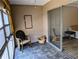 The lanai is a cozy space with a chair and room for seating at 4500 37Th S St # 27, St Petersburg, FL 33711