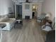 Spacious living room with wood flooring and neutral paint scheme at 4500 37Th S St # 27, St Petersburg, FL 33711