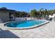 A refreshing community pool featuring cool, blue water and comfortable lounge chairs at 4500 37Th S St # 27, St Petersburg, FL 33711