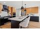 Modern kitchen island with seating and breakfast bar at 475 Island Way, Clearwater Beach, FL 33767